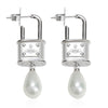 Saturn Lock Pearl Earrings (with box)