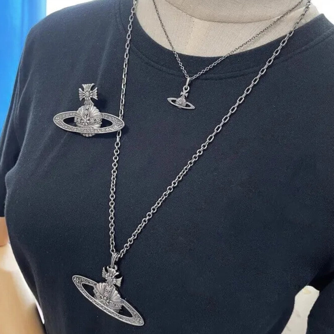 Antique Silver Carved Saturn Necklace
