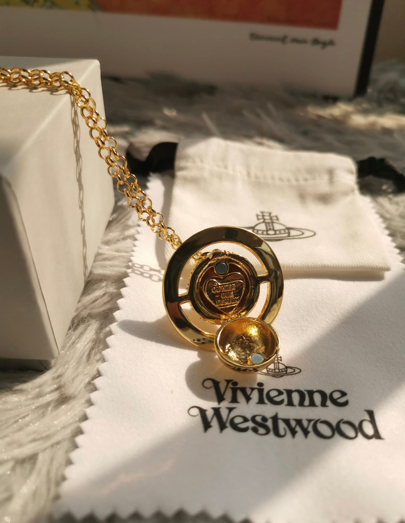 Gold container necklace (with box)