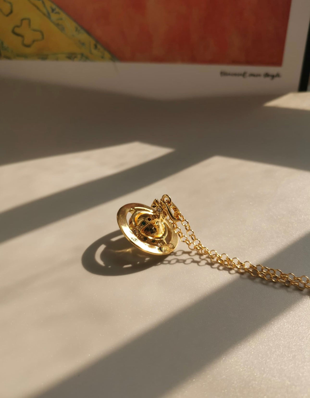 Gold container necklace (with box)